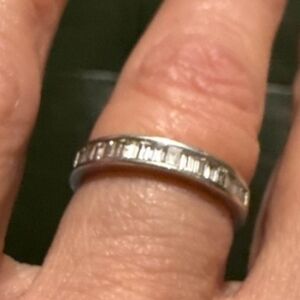 Size 7.Emerald cut baguettes 14 karat white gold